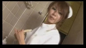Sexy Asian nurse in tight white pantyhose playing with her wet snatch